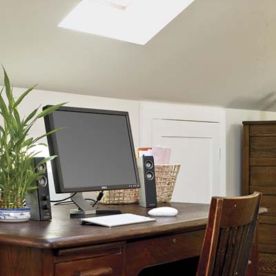 skylight above a home office in the remodeled attic