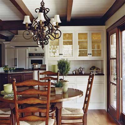 a partial wall and L-shaped peninsula separated the kitchen from the family room