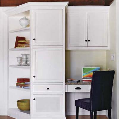 open shelves are angled toward the seating area by the hearth