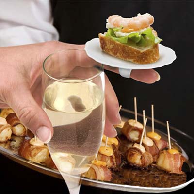 little disposable party plates that fit on your finger via a ring on the bottom