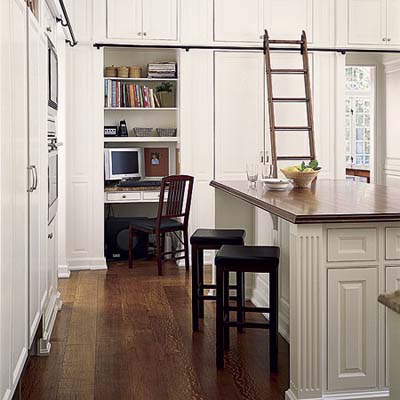 50 linear feet of upper cabinets provide storage for infrequently used kitchen gear