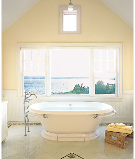 traditional tub and mosaic tiles