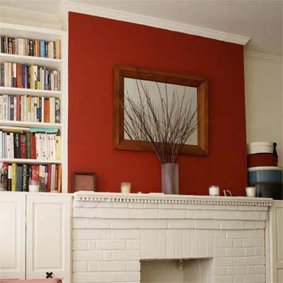 Painting one wall in a room red adds a pop of active color