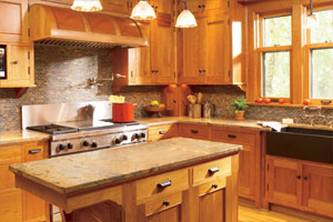 custom built cherry cabinets installed in an open kitchen