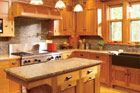 custom built cherry cabinets installed in an open kitchen