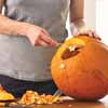 pumpkins with designs drilled into them, and lit with strings of christmas lights