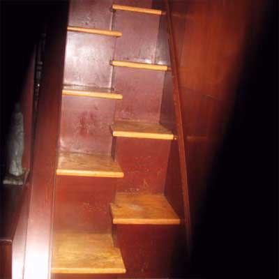 mismatched half-steps cobbled together and leading up to a loft office