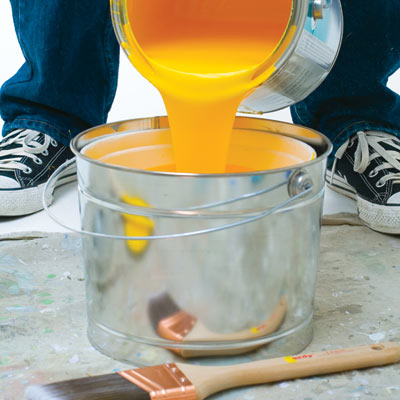 man disposing of paint