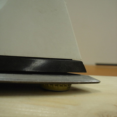 fixing hammer mark on trim using iron and bottle cap