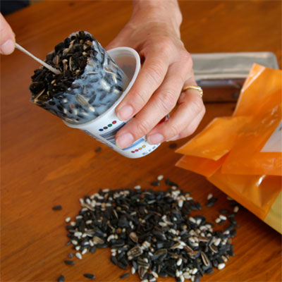 yogurt cups used to shape solid bird feed