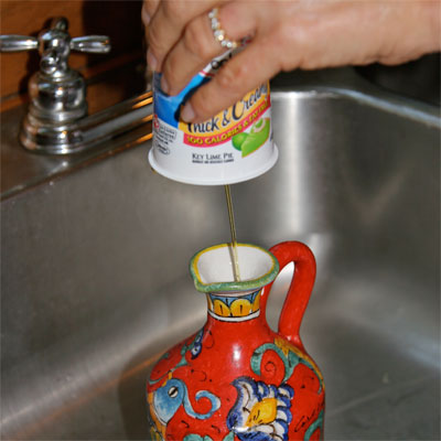 yogurt cups used to create a funnel