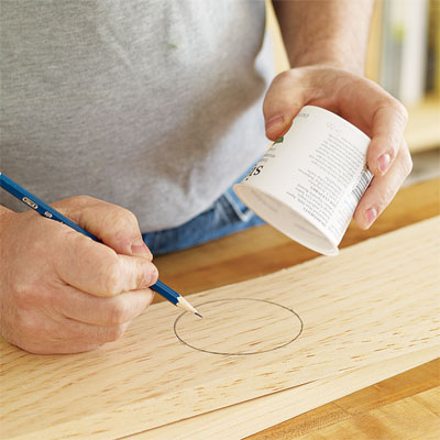 yogurt cups used as a template for drawing small curves