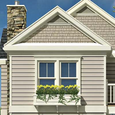 the Photoshop rendering of an architect's proposed changes to a house emphasizing a bumpout addition in the front