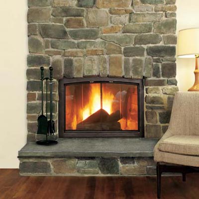 a fireplace with stone surround