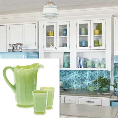 green colored glass pitcher and tumblers