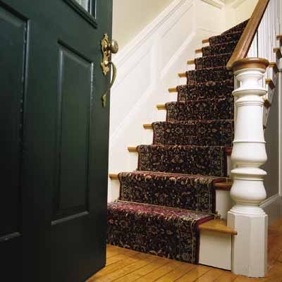 Attaching a stair runner to treads
