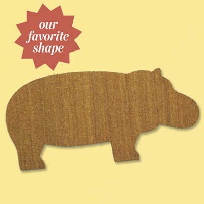 colorful natural fiber and vinyl doormat shaped like a hippo; welcome mat