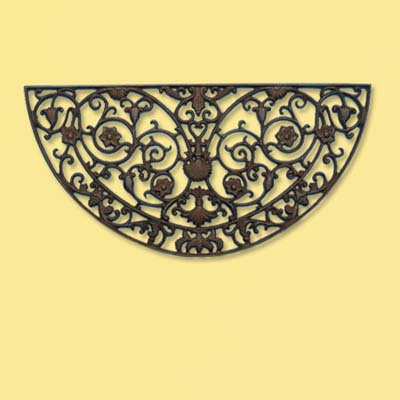 cast iron doormat in an ornate crescent shape; welcome mat