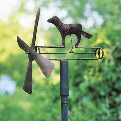 vintage-style whirligig with pinwheel and metal dog topper