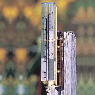 rainfall gauge attached to fence