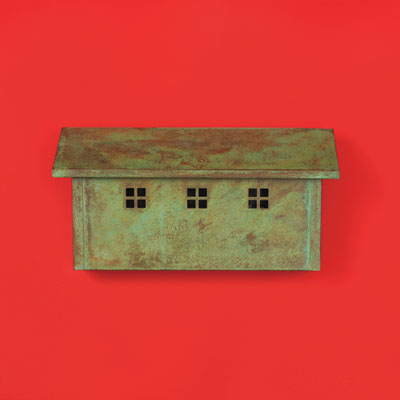 a patinated solid brass Arts and Crafts style wall-mount mailbox