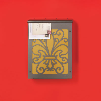 a galvanized steel painted wall-mount mailbox with a fleur-de-lis painted on the front
