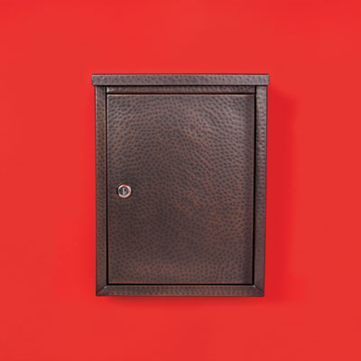 a galvanized steel wall-mount mailbox with an antiqued copper stippled finish