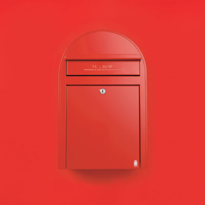 an oversized red zinc-plated steel wall-mount mailbox