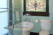 remodeled bathroom with claw foot tub