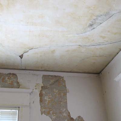 cracked and peeling ceiling and walls