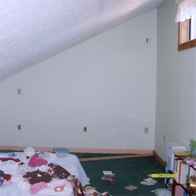 bedroom with sloped ceiling