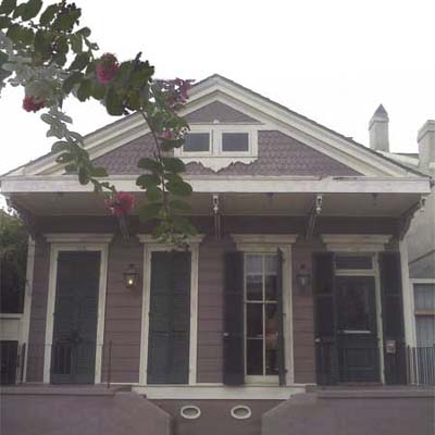 outdated purple victorian house exterior
