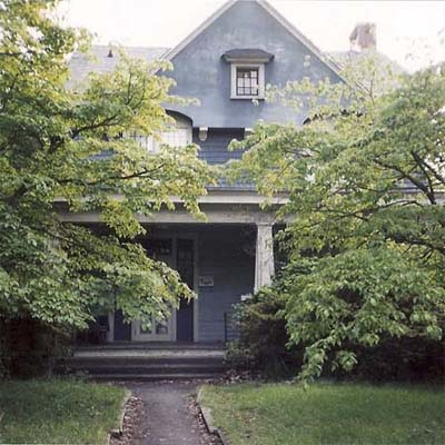 house covered by trees