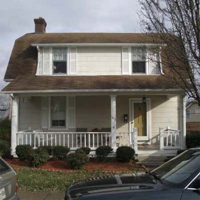 outdated dutch colonial house exterior