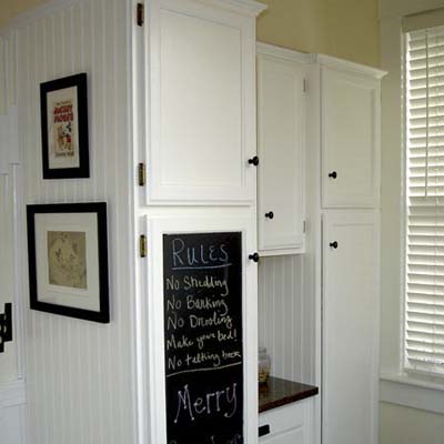 white cabinets with chalkboard paint
