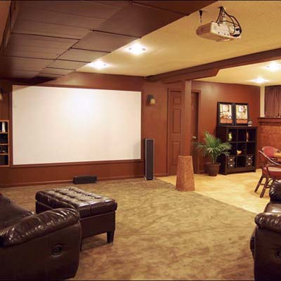 finished basement with projector screen