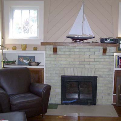 unfinished living room with fireplace