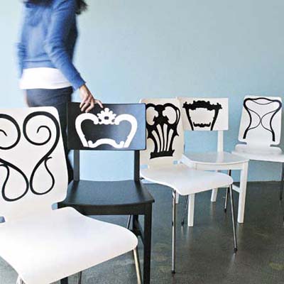 mismatched chairs painted to look like a set