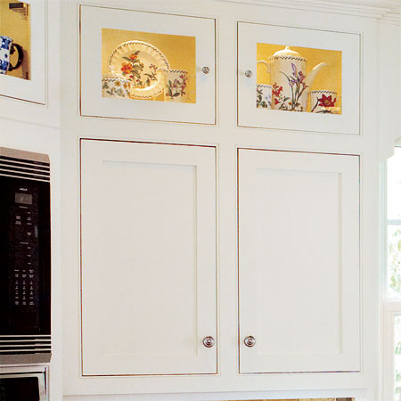 custom kitchen cabinets built by the homeowner in this remodeled greek revival