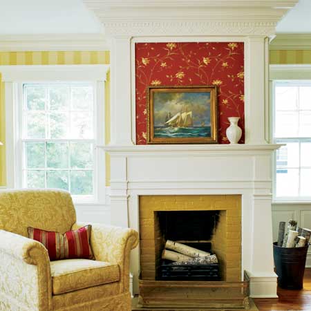 double high mantle on the fireplace of the master suite in this remodeled greek revival