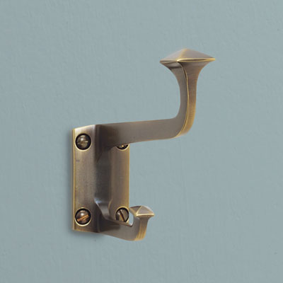 a brass robe hook in a Mission style from Rejuvenation with a burnished antique finish