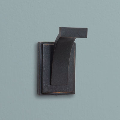a column-shaped brass hook from Restoration Hardware with an oil-rubbed bronze finish