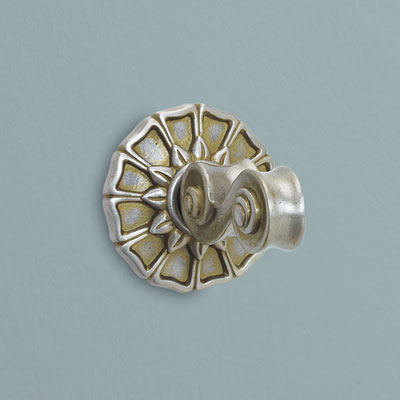a pewter bath hook from Copper Mountain Hardware with a bronze wash