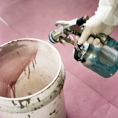 paint sprayer and bucket