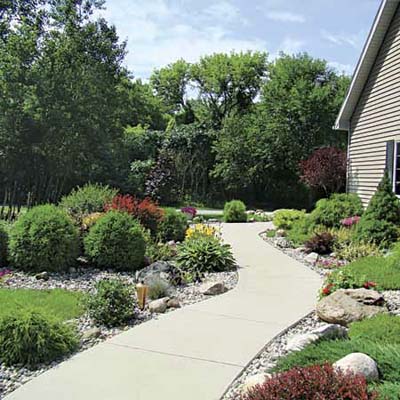 view of walkway and plants in reader's finished pond garden