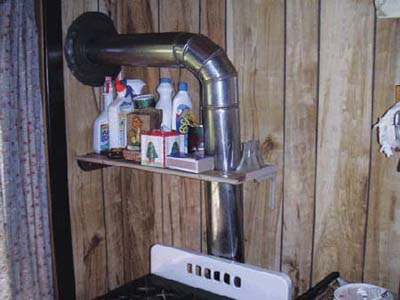 home inspection photo of shelf built around flue