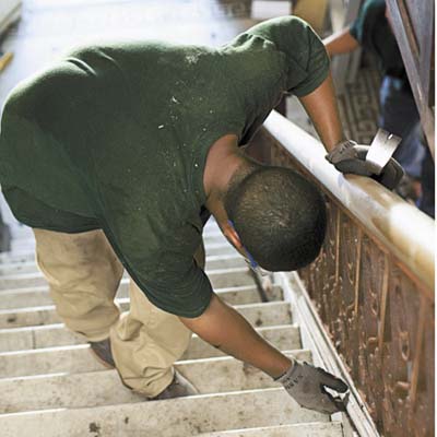 removing wood beneath iron staircase