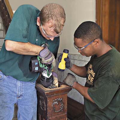 removing wood beneath iron staircase