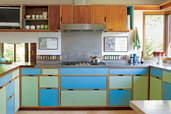 brightly colored kitchen making use of various types of laminate