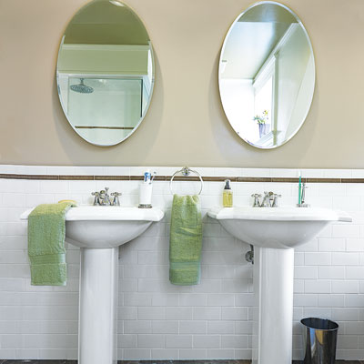 Mulligan master bath with new pedestal sinks and subway tile